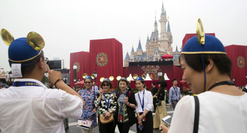 Guests attend an opening ceremony for the Disney Resort in Shanghai China