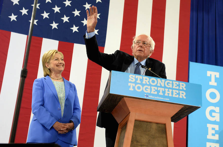 Bernie Sanders introducing presumptive Democratic presidential nominee Hillary Clinton at a rally in Portsmouth New Hampshire