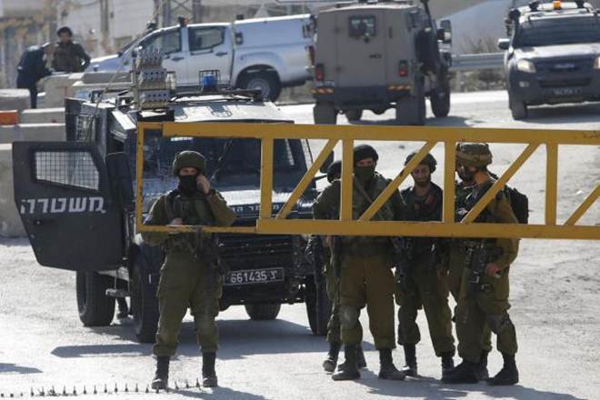 Israel imposes lockdown on tens of thousands of Palestinians in Hebron