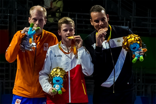 Belgium’s Laurens Devon displays his gold medal in the men table tennis Class 9 event at the ongoing Rio 2016 Paralympic Games