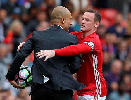 Manchester United's Wayne Rooney clashes with Manchester City manager Pep Guardiola Reuters  Phil Noble