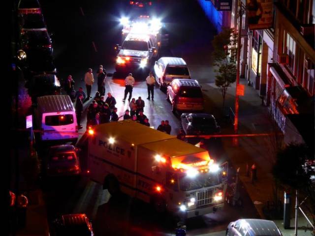 A New York Police Department bomb squad truck deploys near an unexploded pressure cooker bomb on 27th Street hours after an explosion nearby in New York City New York US