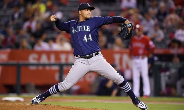 Seattle Mariners starting pitcher Taijuan Walker throws to the plate during the first inning of a baseball game against the Los Angeles Angels Tuesday Sept. 13 2016 in Anaheim Calif