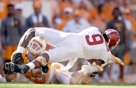 Alabama running back Bo Scarbrough is tackled by Tennessee linebacker Colton Jumper during the first half of an NCAA college football game Saturday Oct. 15 2016 in Knoxville Tenn