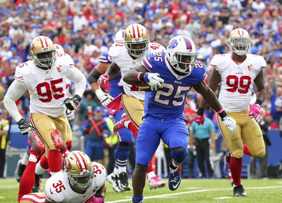 LeSean Mc Coy leaves 49ers defenders behind as he scores one of his three touchdowns en route to 140 yards rushing