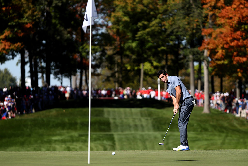 CHASKA MN- OCTOBER 02 Rory Mc Ilroy of Europe putts during singles matches of the 2016 Ryder Cup at Hazeltine National Golf Club