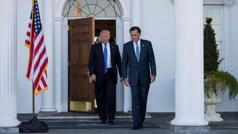 President-elect Donald Trump and Mitt Romney leave the clubhouse after their meeting at Trump International Golf Club