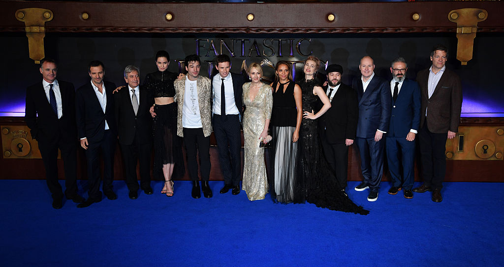 British actress Katherine Waterston, US actor Ezra Miller British actor Eddie Redmayne Scottish author J.K. Rowling British actress Carmen Ejogo US actress Alison Sudol US actor Dan Fogler and British film director Davis Yates pose with