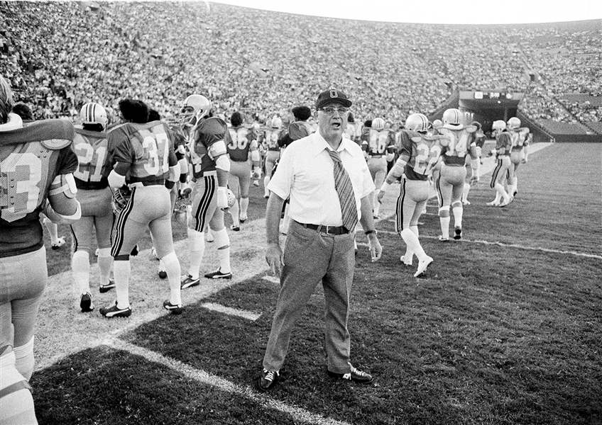 Head coach Woody Hayes of the Ohio State Buckeyes gives orders to his team from the sidelines in 1975.   
    ASSOCIATED PRESS