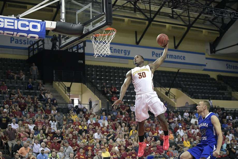 Iowa State guard Deonte Burton goes up for a dunk in front of Indiana State forward Matt Van Scyoc