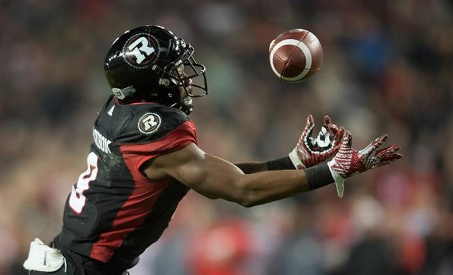 Ottawa Redblacks wide receiver Ernest Jackson catches a touchdown pass during overtime CFL Grey Cup action Sunday