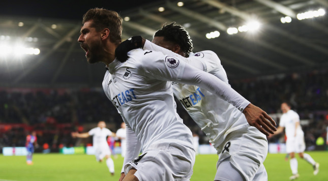 SWANSEA WALES- NOVEMBER 26 Fernando Llorente of Swansea City celebrates scoring his team's fifth goal during the Premier League match between Swansea City and Crystal Palace at Liberty Stadium