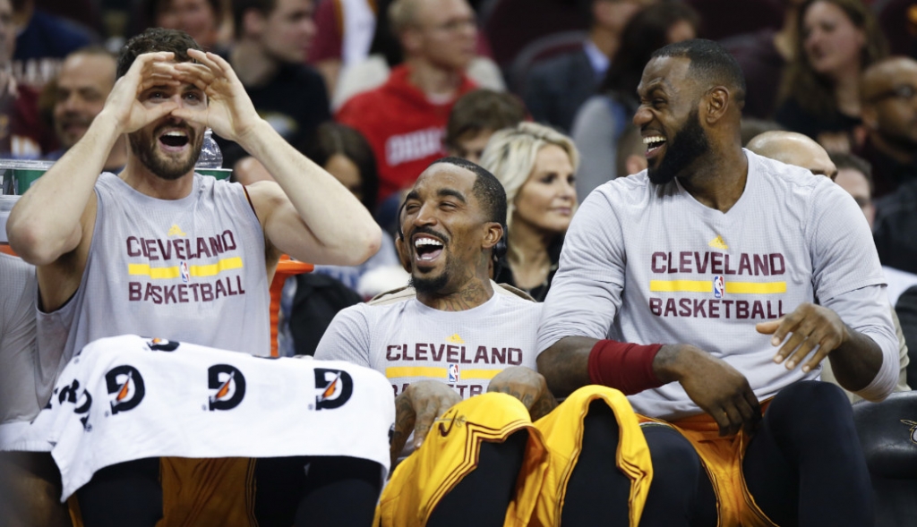 Cleveland Cavaliers&#039 Kevin Love left J.R. Smith center and Le Bron James share a laugh on the bench during the second half of an NBA basketball game against the Dallas Mavericks on Friday Nov. 25 2016 in Cleveland. The Cavaliers won 128-90. (AP