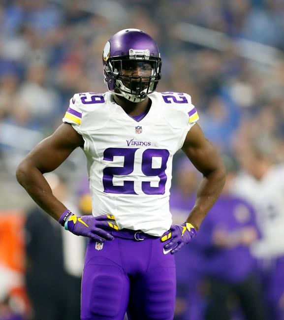 Minnesota Vikings cornerback Xavier Rhodes stands during the second half of an NFL football game against the Detroit Lions in Detroit. The Vikings play the Dallas Cowboys on Thursday Dec. 1 2016. (AP Ph