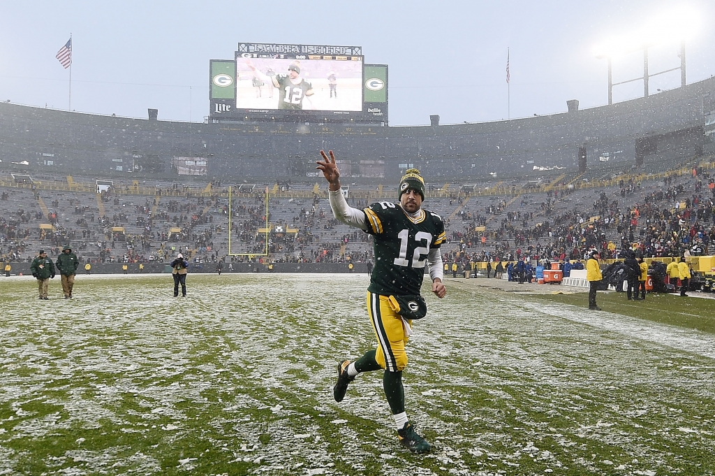 GREEN BAY WI- DECEMBER 04 Aaron Rodgers #12 of the Green Bay Packers leaves the field following a game against the Houston Texans at Lambeau Field