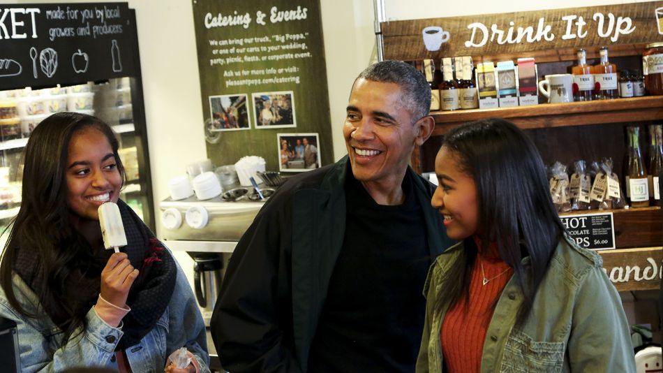 President Barack Obama buys ice cream for his daughters Malia and Sasha at Pleasant Pops during Small Business Saturday