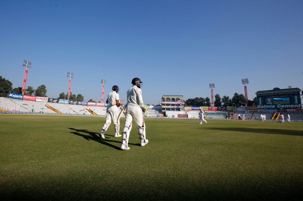 Ravichandran Ashwin and Ravindra Jadeja walk out to bat on day three.
Ravichandran Ashwin and Ravindra Jadeja walk out to bat on day three