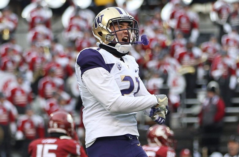 Washington wins Pac-12, eyes playoff slot