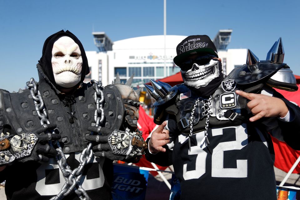 Fans tailgate before the AFC Wild Card game