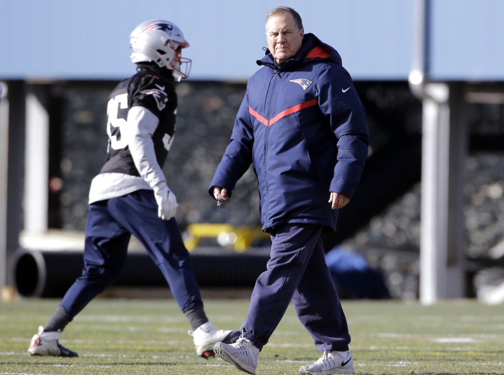 New England Patriots head coach Bill Belichick watches his players during NFL football practice Wednesday Dec. 28 2016 in Foxborough Mass