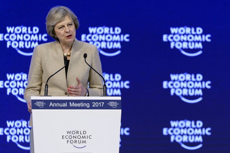 British Prime Minister Theresa May delivers her speech on the third day of the Forum's annual meeting