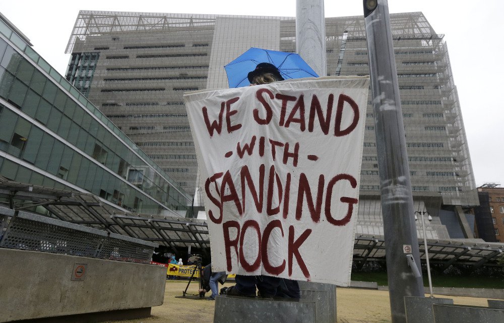 Opponents of the Dakota Access oil pipeline protest at the San Francisco Federal Building on Wednesday. Several people were arrested for blocking access to the building