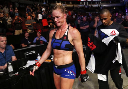 Holly Holm leaves after she lost to Valentina Shevchenko of Kyrgyzstan in a women's bantamweight mixed martial arts bout at United Center in Chicago Saturday