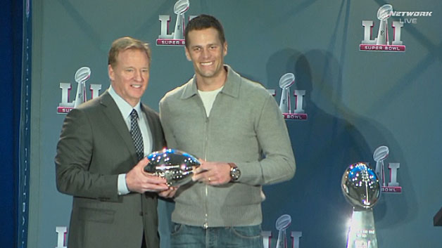 Patriots quarterback Tom Brady poses with the Super Bowl MVP trophy with NFL commissioner Roger Goodell