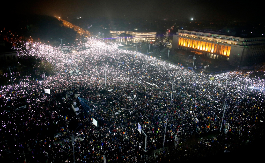 Tens of thousands of people gather for a demonstration in from of the government building in Bucharest Romania Sunday Feb. 5 2017. Romania's government met Sunday to repeal an emergency decree that decriminalizes official misconduct a law that