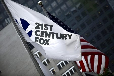 The flag of the Twenty First Century Fox Inc is seen waving at the company headquarters in the Manhattan borough in New York