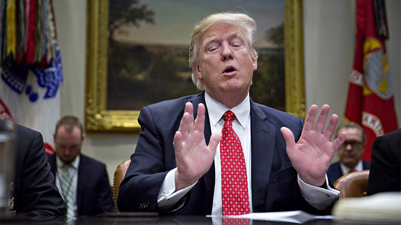 U.S. President Donald Trump speaks as he meets with county sheriffs during a listening session in the Roosevelt Room of the White House