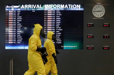 A Hazmat team conducts checks at KLIA2 airport terminal in Sepang Malaysia