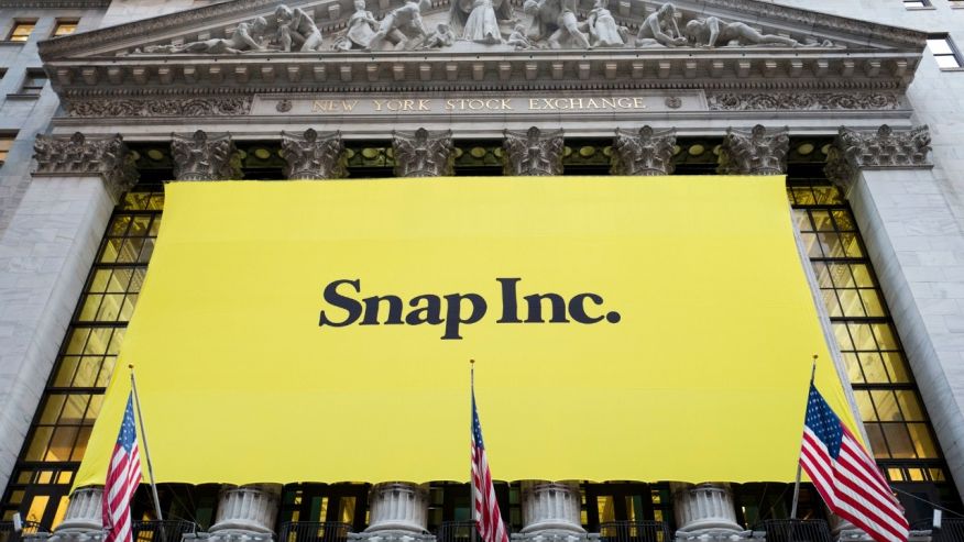 A banner for Snap Inc. hangs from the front of the New York Stock Exchange Thursday