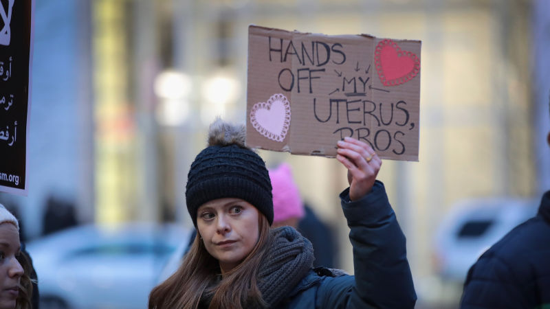 A demonstrator in Chicago on February 11 voicing support for Planned Parenthood part of series of protests nationwide. Image via Getty