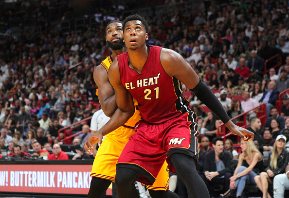 Miami Heat center Hassan Whiteside fights for position under the basket against Cleveland Cavaliers center Tristan Thompson during the third quarter of an NBA basketball game at American Airlines Arena Saturday