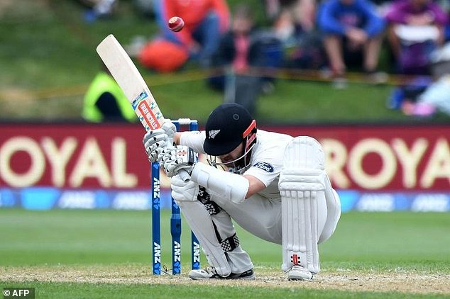 New Zealand's captain Kane Williamson ducks a bouncer on day three of their first Test match against South Africa at the University Oval in Dunedin