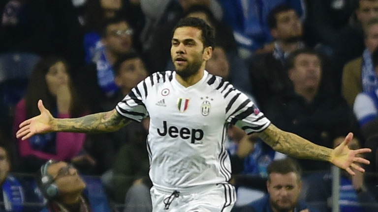 Dani Alves celebrates after putting Juventus ahead in the first leg