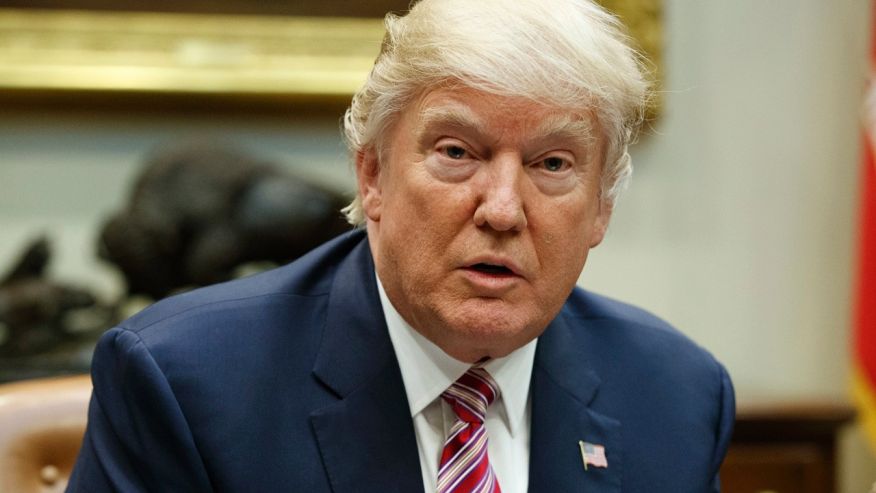 President Donald Trump speaks in the Roosevelt Room of the White House in Washington Friday