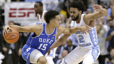 North Carolina's Joel Berry II guards Duke's Frank Jackson during the first half of an NCAA college basketball game in Chapel Hill N.C. Saturday