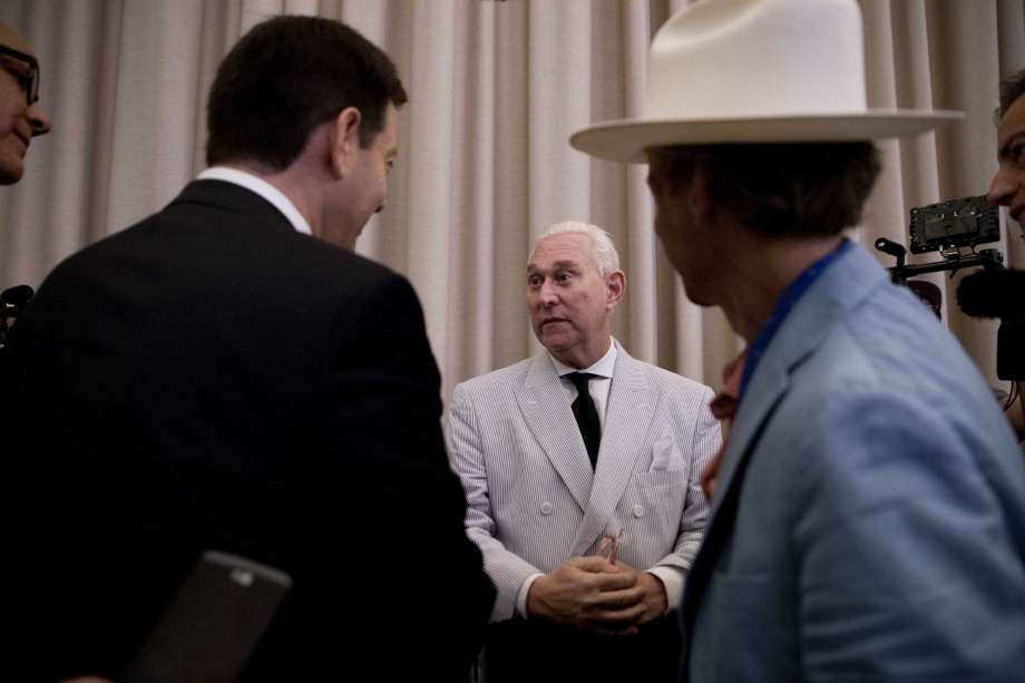 2016 Roger Stone an adviser to Donald Trump center speaks to reporters in New York. Stone says he believes his contacts with a Russian-linked hacker who took credit for breaching the Democratic National Committee were obta