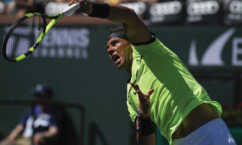 INDIAN WELLS Rafael Nadal of Spain serves to Argentina's Guido Pella during their match at the BNP Paribas Open.— AP