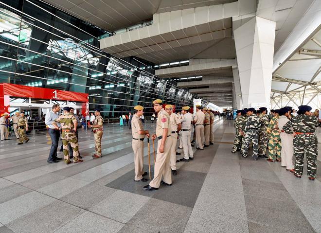 Security personnel stand guard at IGI airport where Shiv Sena MP Ravindra Gaikwad was about to arrive to catch a flight in New Delhi on Friday. Fedration of Indian Airlines condemned Gaikwad's assualt on an Air India staff member. PTI