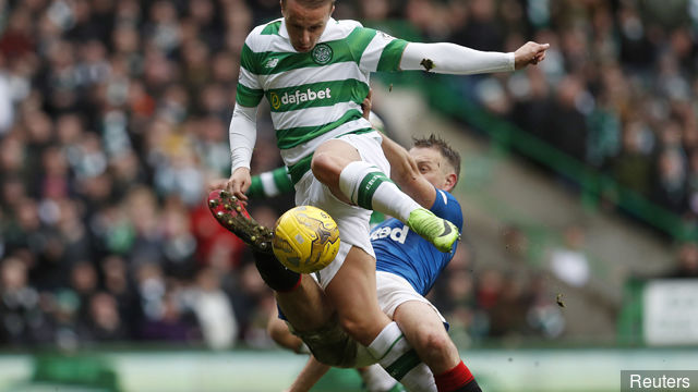 Rangers Clint Hill in action with Celtic's Leigh Griffiths