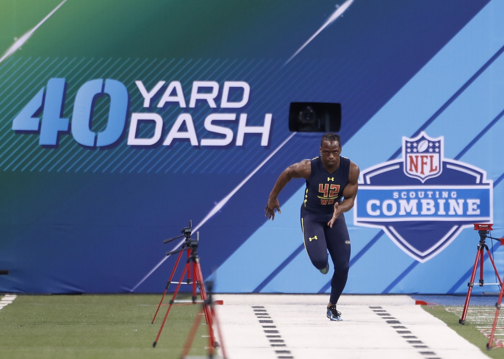 Mar 4 2017 Indianapolis IN USA Washington Huskies wide receiver John Ross runs the 40 yard dash during the 2017 NFL Combine at Lucas Oil Stadium. Mandatory Credit Brian Spurlock-USA TODAY Sports