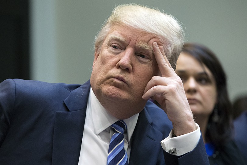 President Donald Trump attends a meeting on health care on Monday at the White House