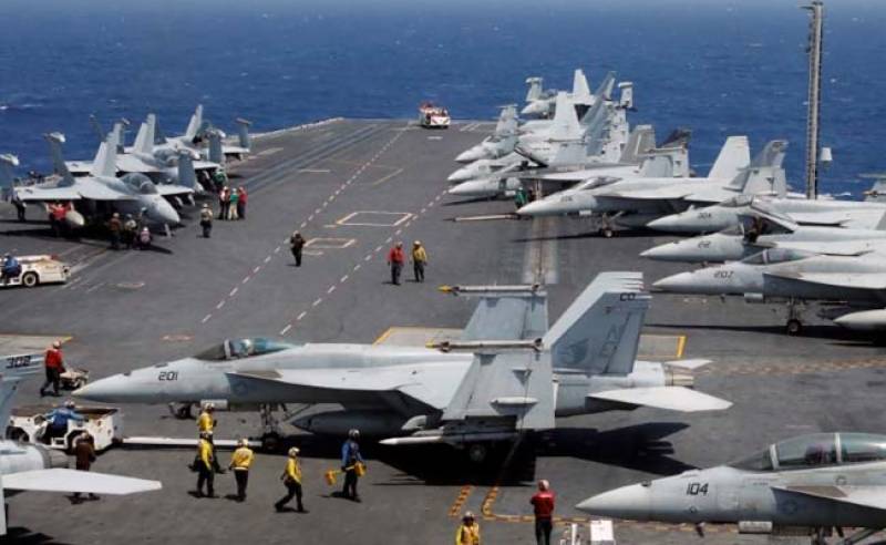 N Korea warns of merciless strikes as US carrier joins S Korea drills