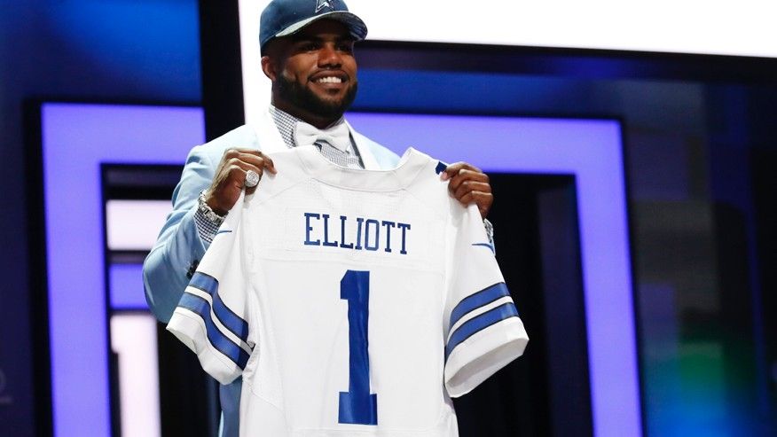 Apr 28 2016 Chicago IL USA Ezekiel Elliott after being selected by the Dallas Cowboys as the number four overall pick in the first round of the 2016 NFL Draft at Auditorium Theatre