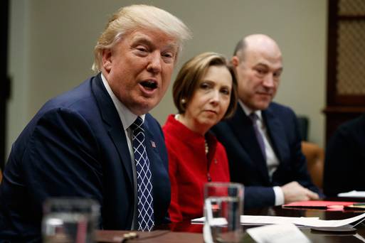 President Donald Trump with Cape Cod Five Cents Savings Bank CEO Dorothy Savarese and National Economic Council Director Gary Cohn at a meeting with leaders from small community banks