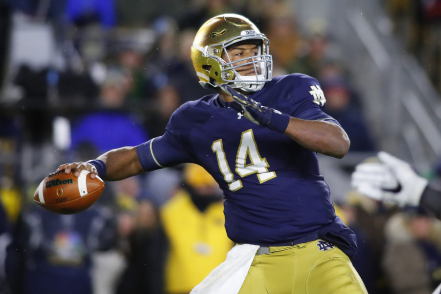 Notre Dame Fighting Irish quarterback De Shone Kizer looks down field to throw the football during the fourth quarter of the NCAA Football game between the Virginia Tech Hokies and the Notre Dame Fighting Irish