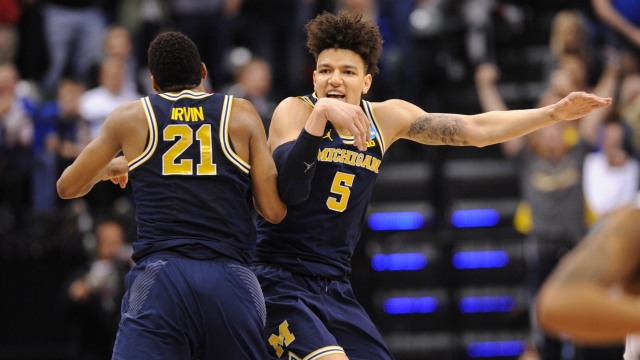 Michigan became the third Big Ten squad to clinch a Sweet 16 berth after knocking off Louisville